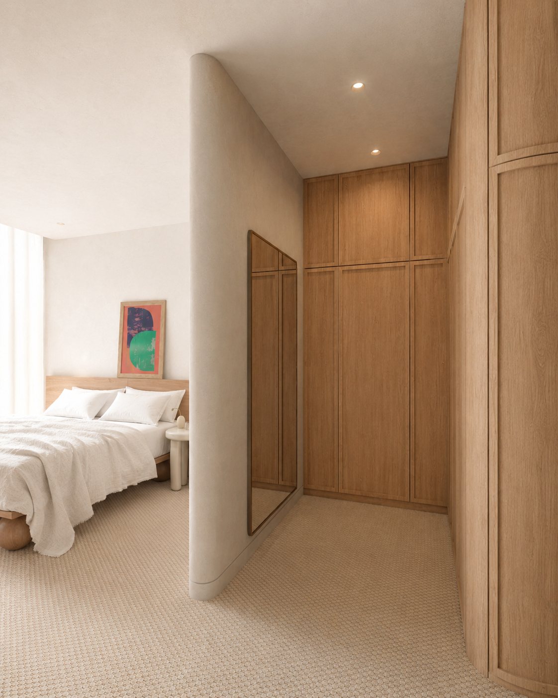 Bedroom and oak walk-in robe divided by a curved plaster wall, upcoming project