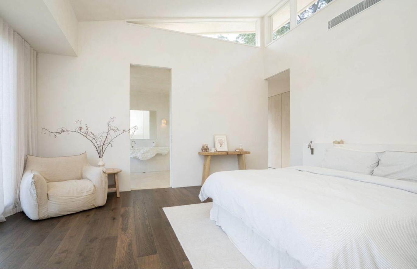 Bedroom with upholstered armchair, Komorebi Home