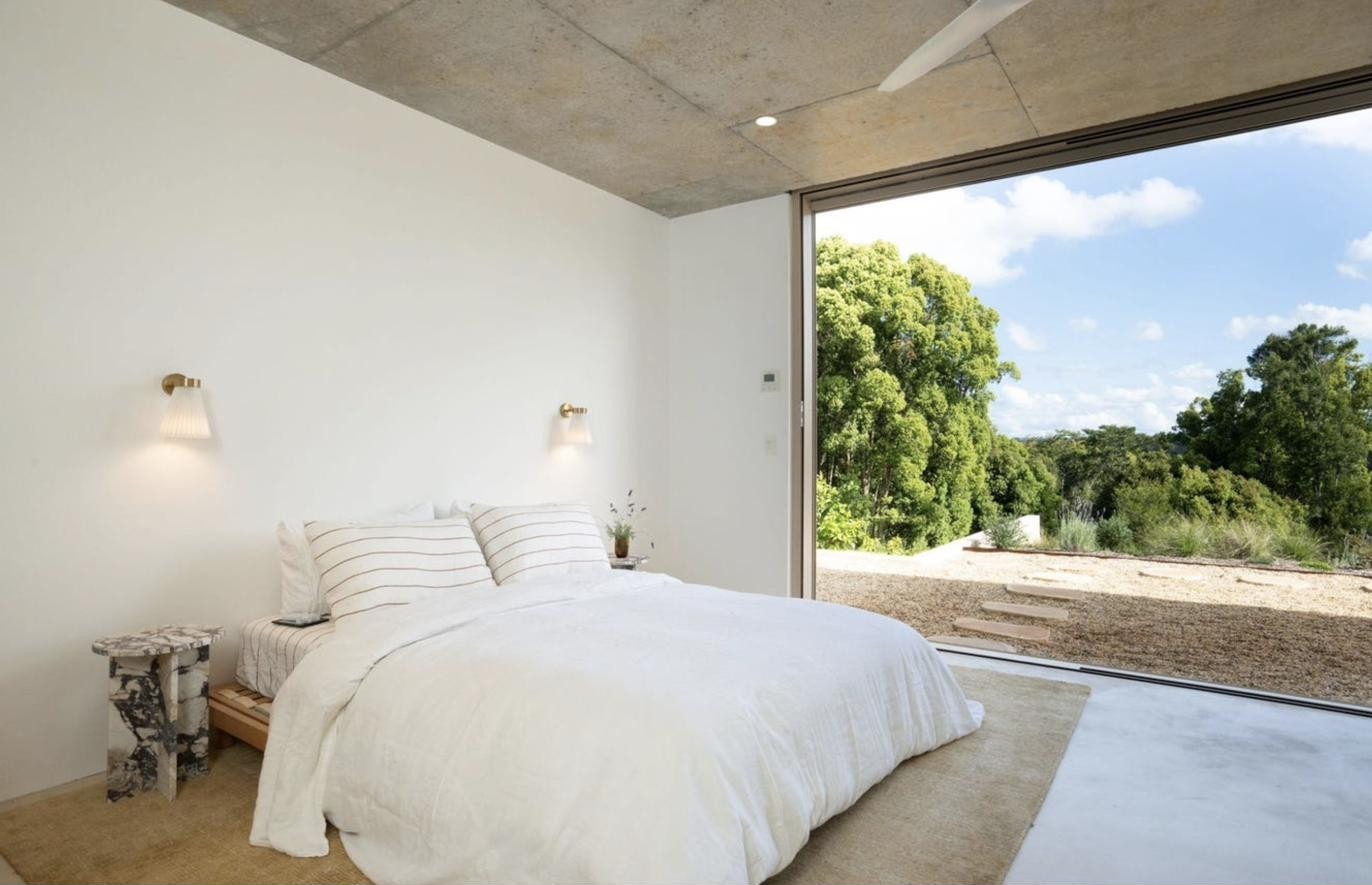 Bedroom opening onto the paddock beyond, Komorebi Home