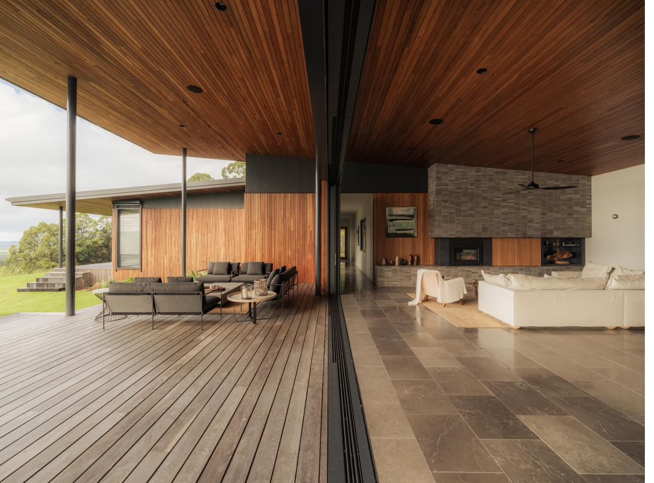 Living space opening onto the timber deck, Newrybar Residence