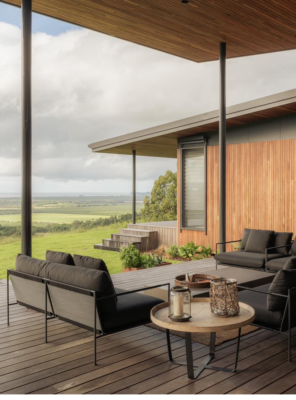 Outdoor deck lounge with paddock views, Newrybar Residence