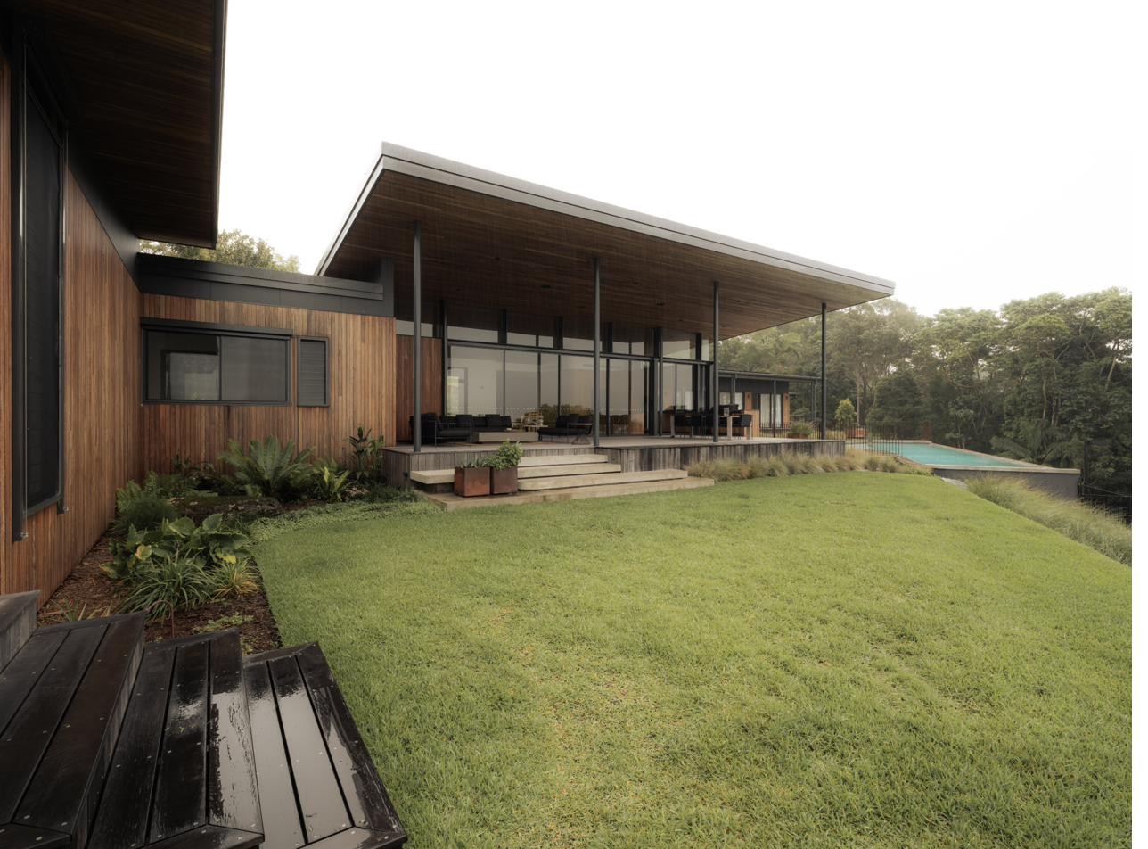 Timber-clad exterior opening onto the deck, Newrybar Residence